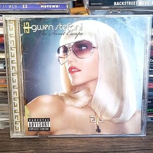 - The Sweet Escape CD